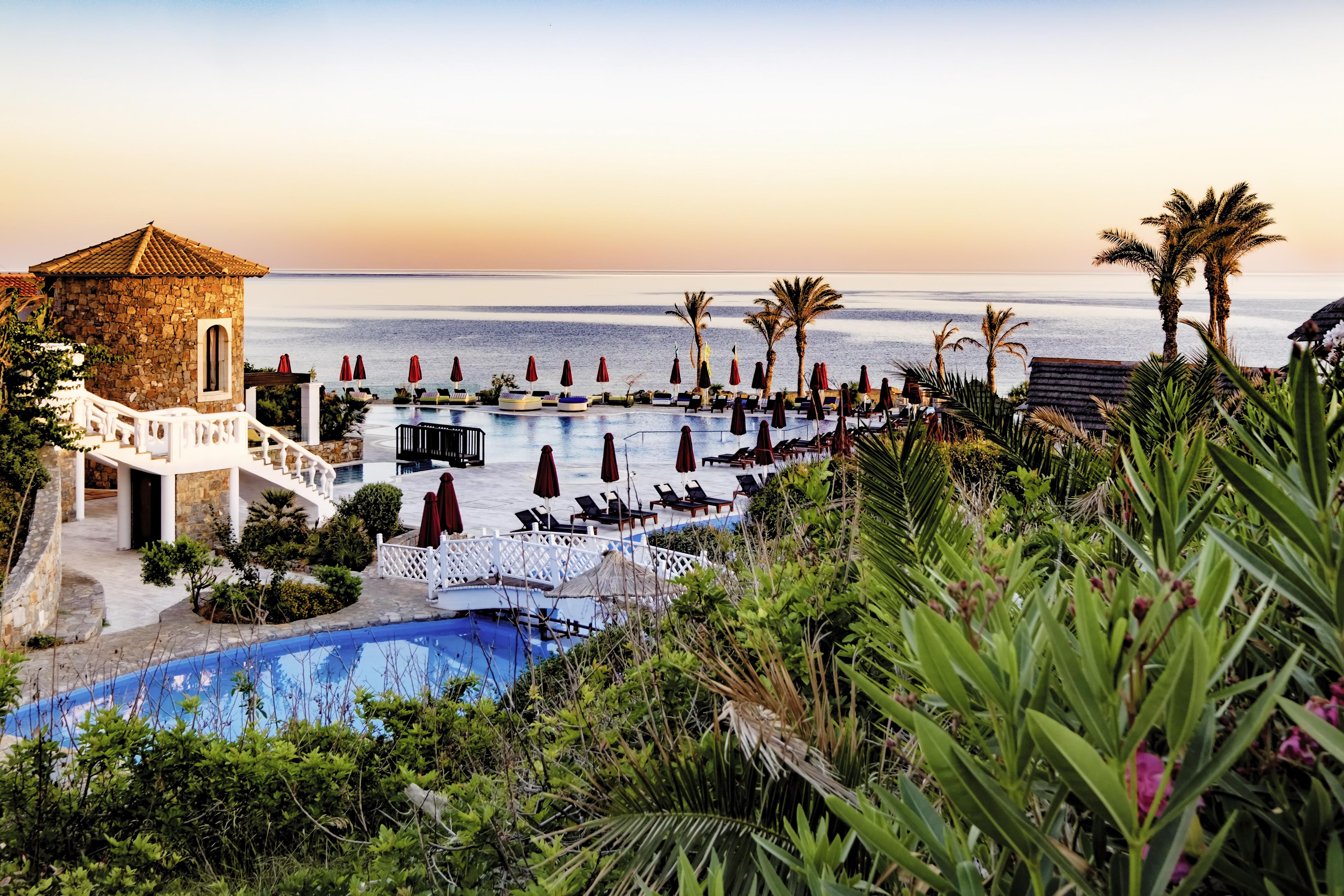 Minos Imperial Luxury Beach Resort & Spa Milatos Exterior photo The resort at sunset