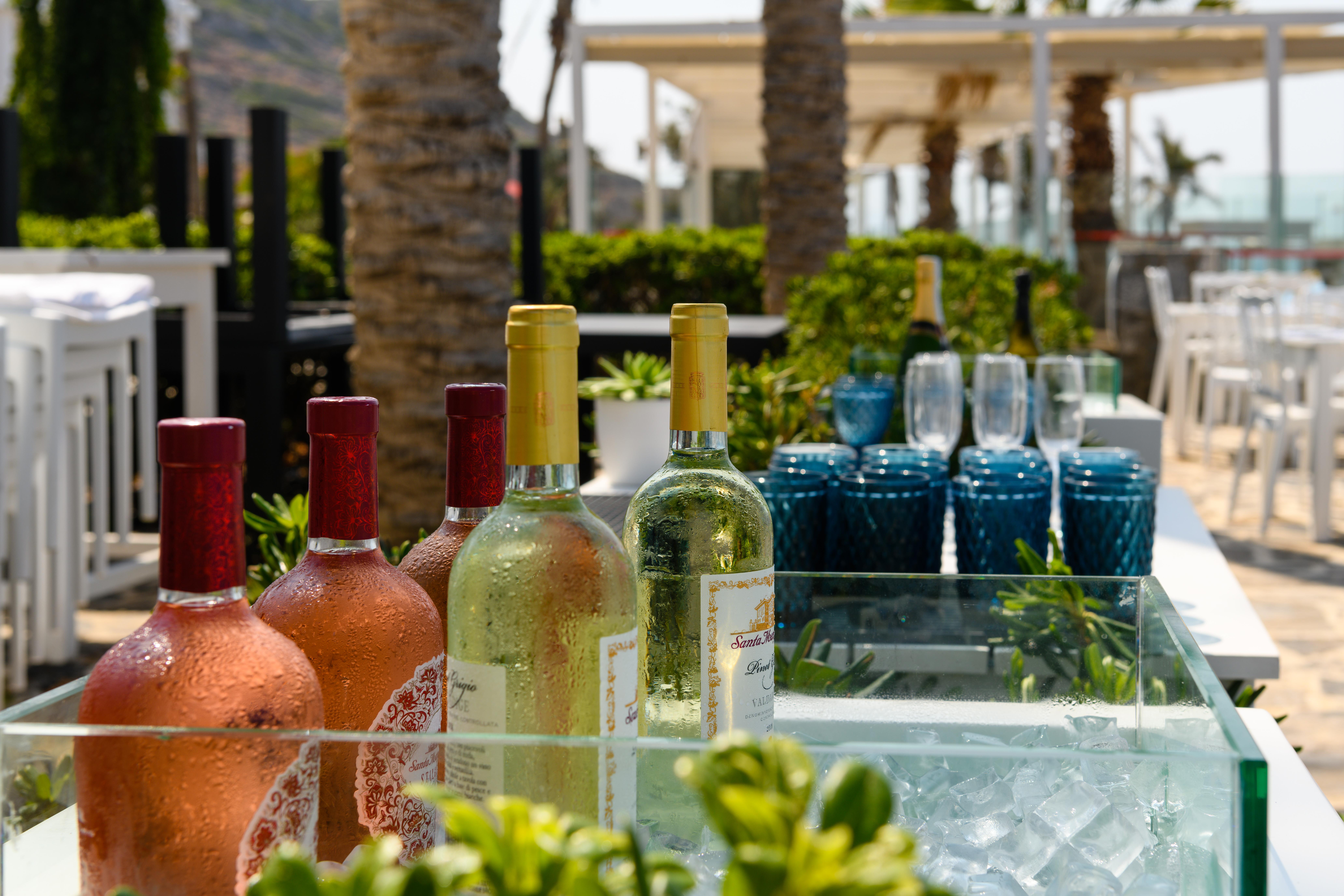 Minos Imperial Luxury Beach Resort & Spa Milatos Exterior photo Wine at a poolside bar